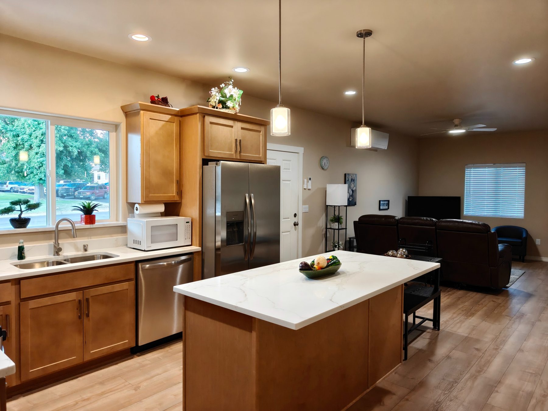 Open kitchen with island and living room